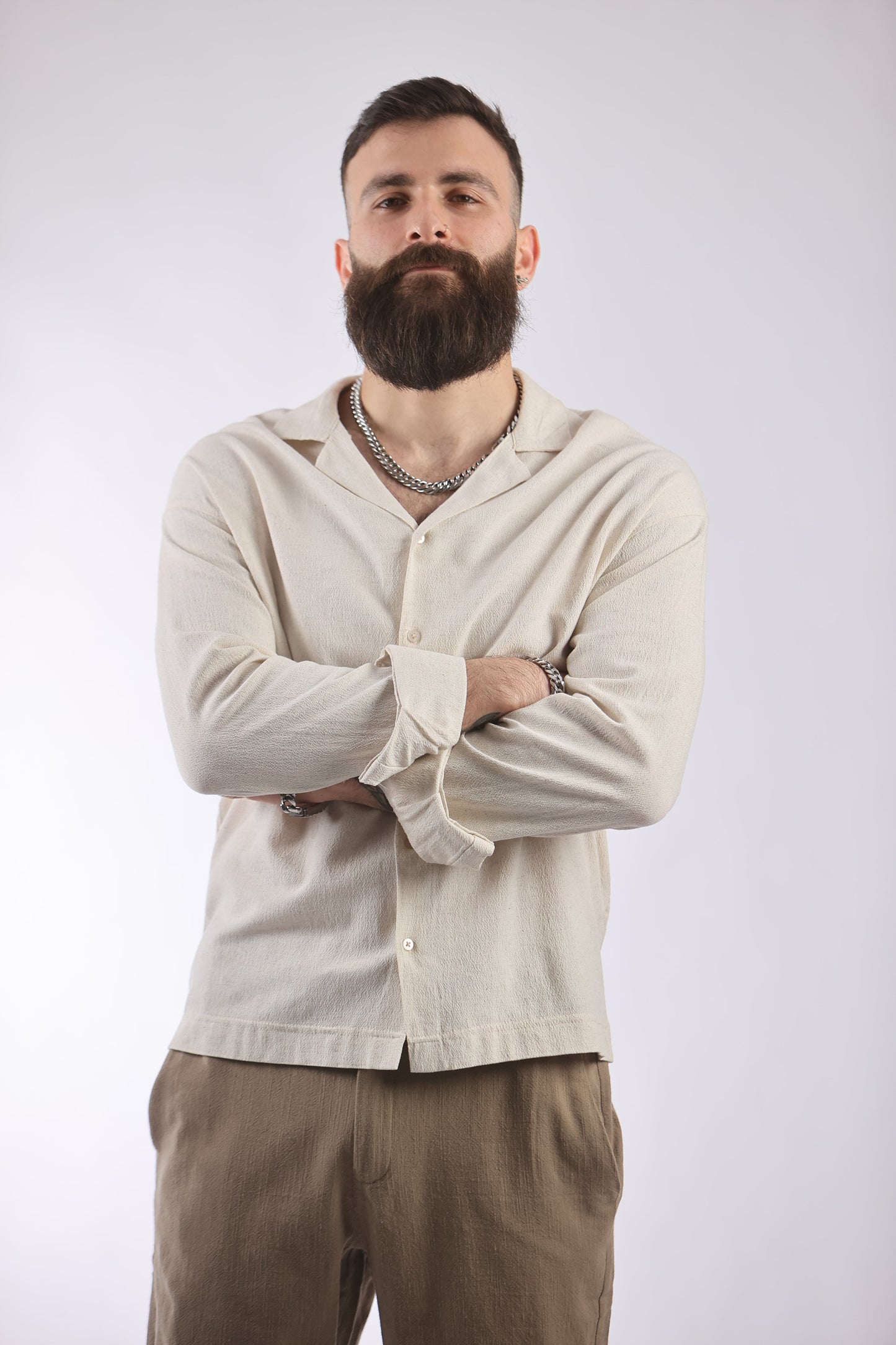 Man wearing a lightweight, breathable Marrakech shirt designed for comfort.