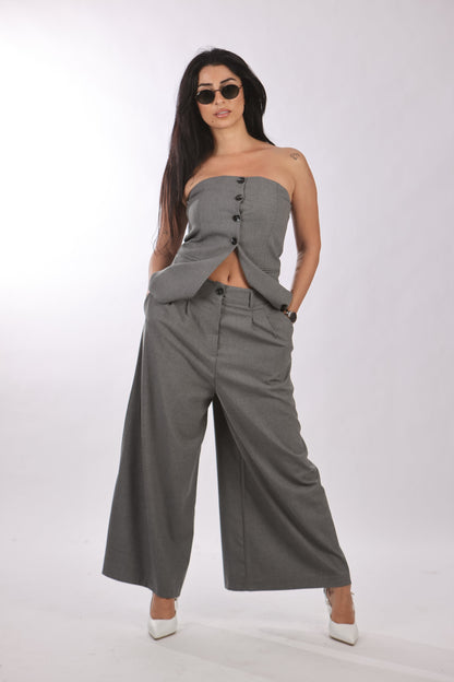 Quzu vest with buttoned-down front in gray, styled with matching wide-leg pants.