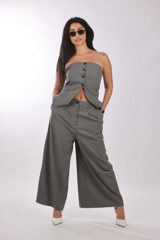 Quzu vest with buttoned-down front in gray, styled with matching wide-leg pants.